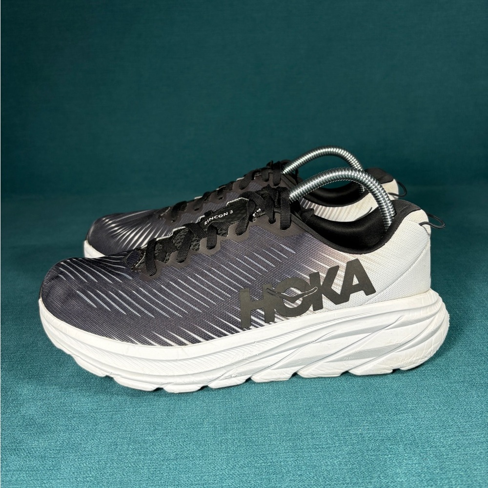 Hoka Black and White Athletic Shoes with Mesh Uppers and Cushioned Midsoles
